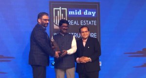 Mr. Ajay Nair, COO receiving the Iconic Developer Of The Year award on behalf of JP Infra Mumbai