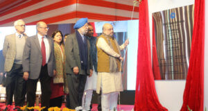 The Union Home Minister, Shri Amit Shah laying the foundation