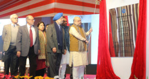 The Union Home Minister, Shri Amit Shah laying the foundation